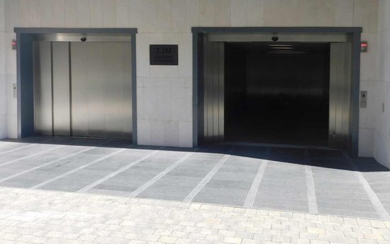 Two TRAFFICO car lifts in central London with telescopic doors. 