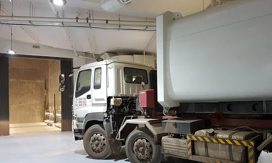 lorry leaving a warehouse
